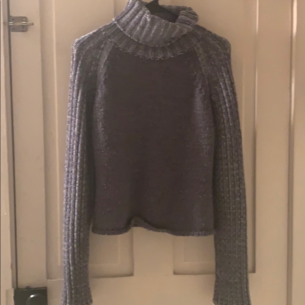 Gray turtleneck sweater.